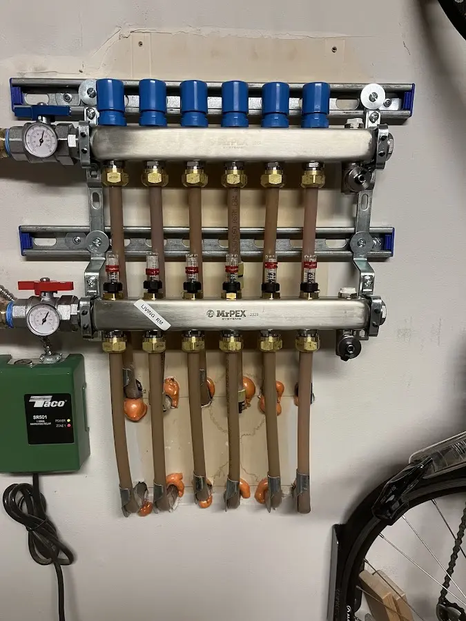 Plumber performing Water Heater Repair at a residential property in Grandwood Park